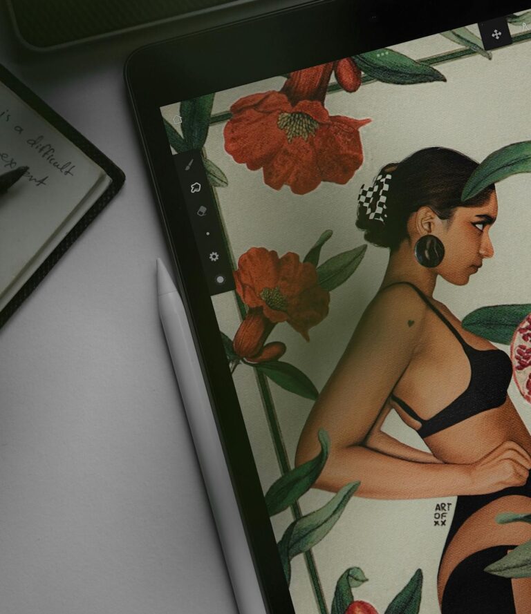 A digital artwork featuring a woman surrounded by flowers displayed on a tablet.
